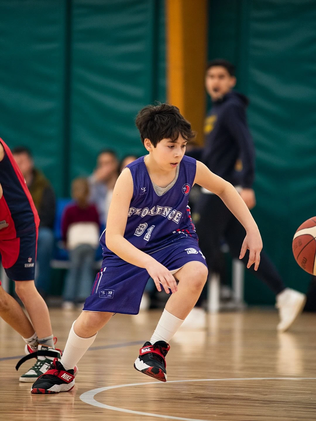 Minibasket Florence: bambino in azione